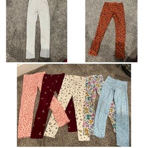 7 pairs of little girl’s leggings size 7/8